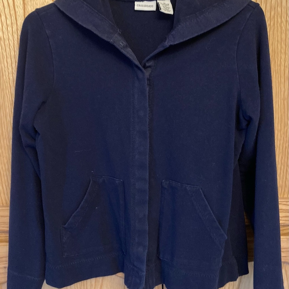 Blue snap down jacket with hood.